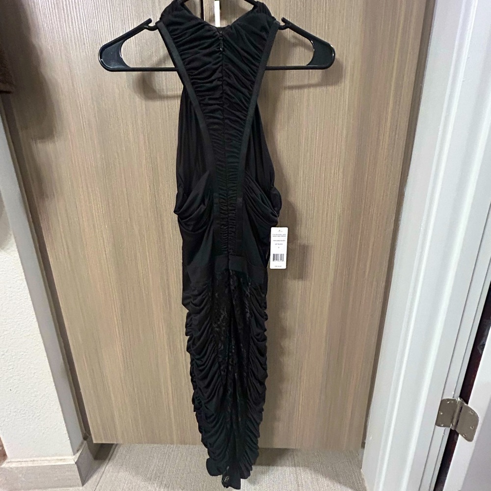 Gorgeous Brand New Bebe Dress with tags!  Stunning on!